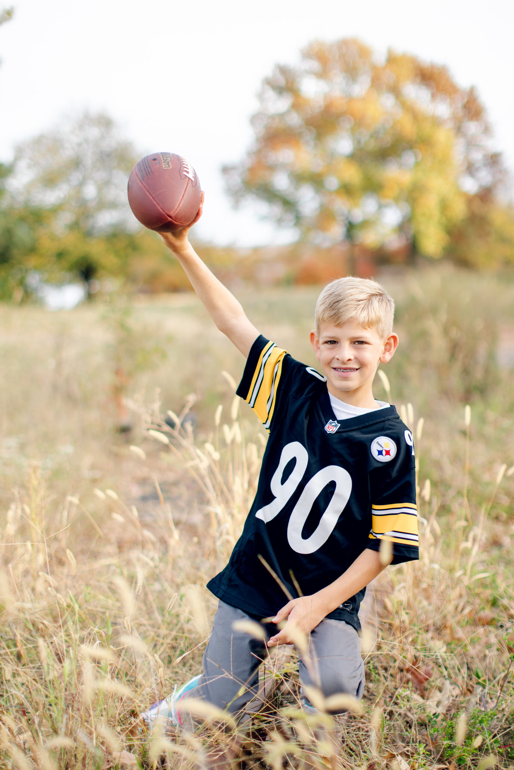 Boy holding a football