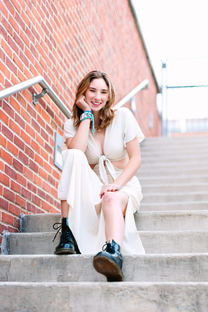 girl sat on steps