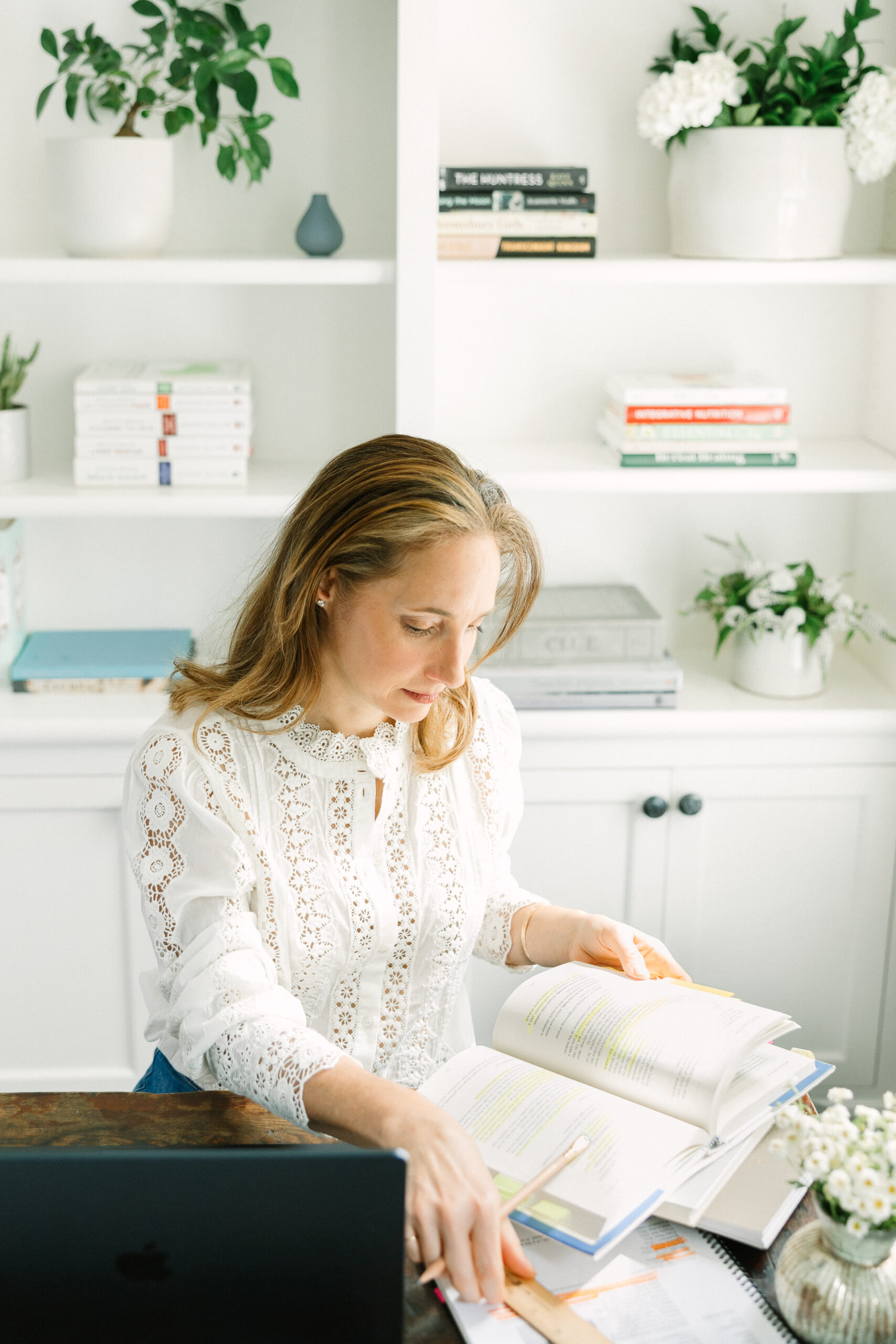 Showing a holistic health coach at work in her office.