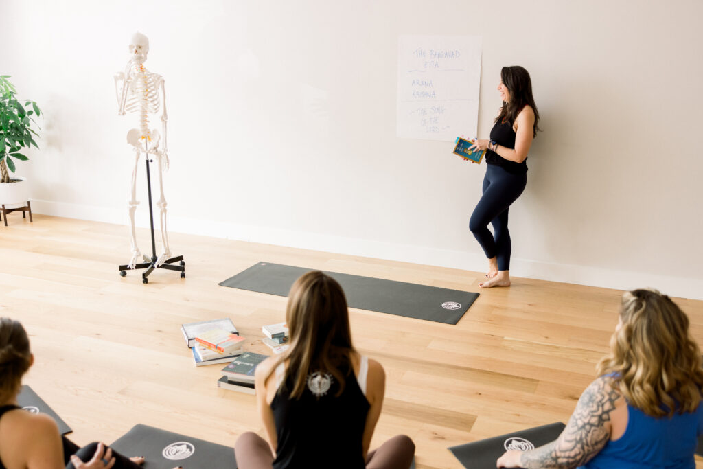 Image of a yoga training session in progress during a brand photo shoot in Alexandria VA.